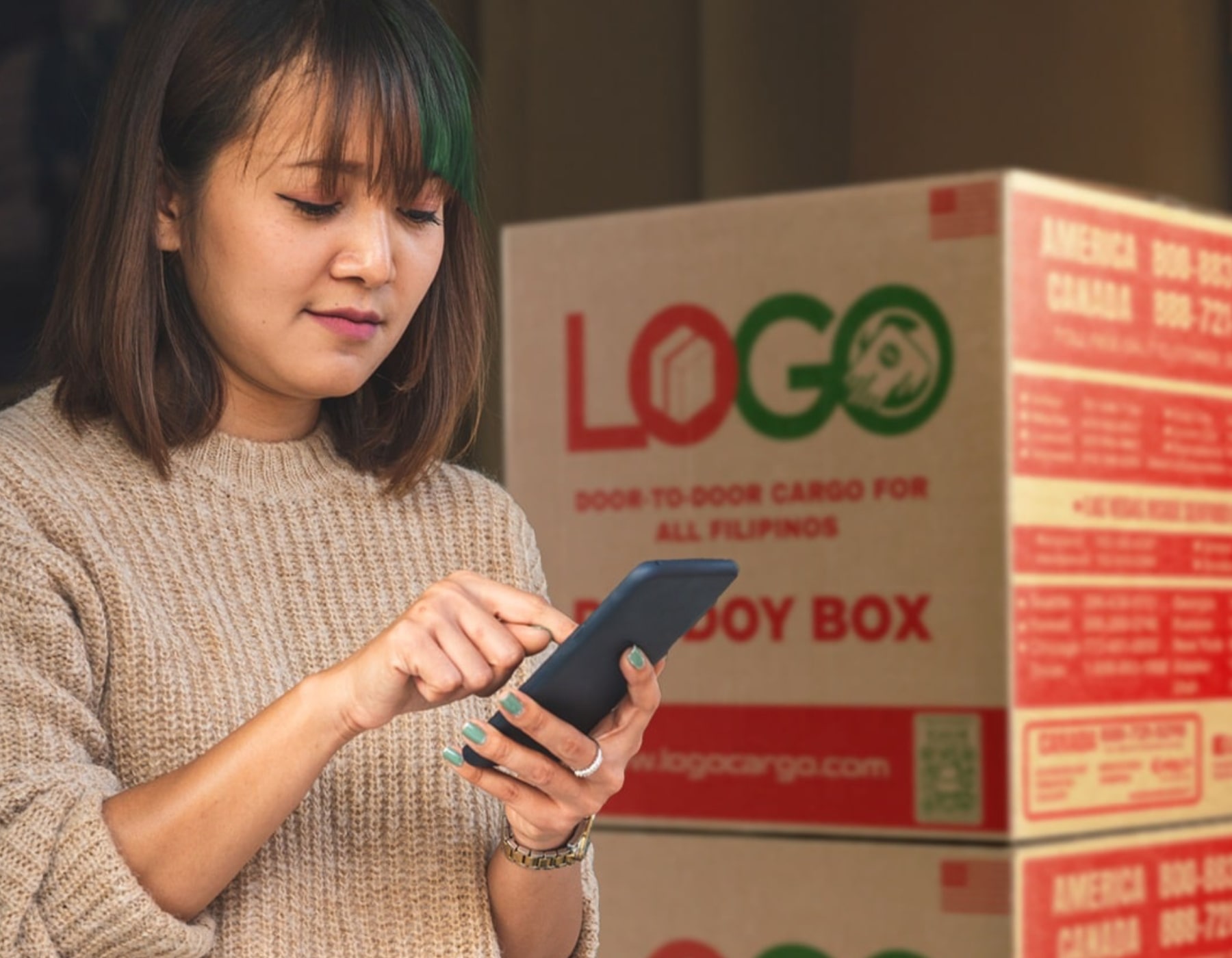 Customer preparing a LOGO Cargo balikbayan box